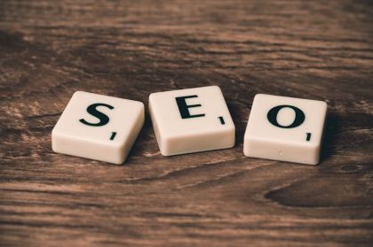 Small business owner doing SEO work on laptop