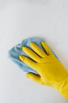 Cleaning a silicone wristband with soap and water to restore it to near-new condition
