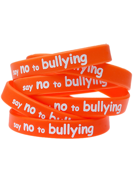 Orange Say No to Bullying silicone wristbands stacked together, pre-printed anti-bullying awareness bands