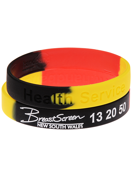 Stacks of coloured silicone wristbands for assigning team building groups by colour