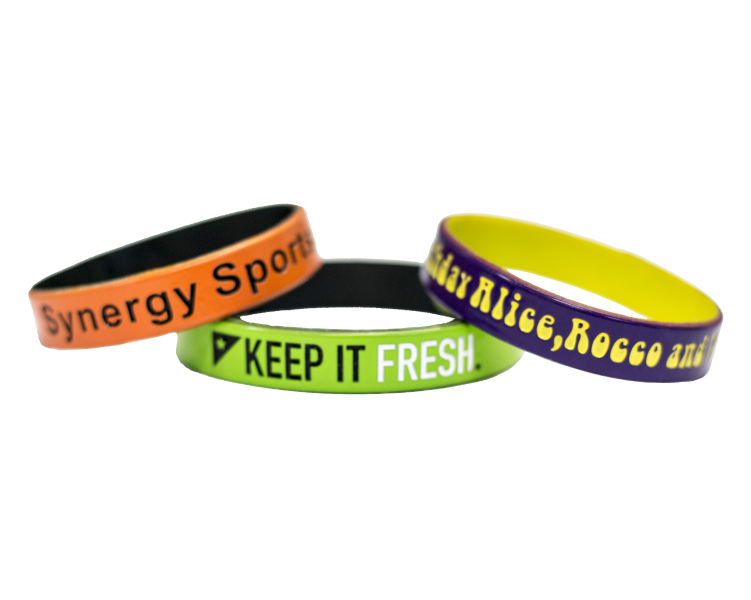 Dual-layer laser corporate wristbands stacked in brand colours
