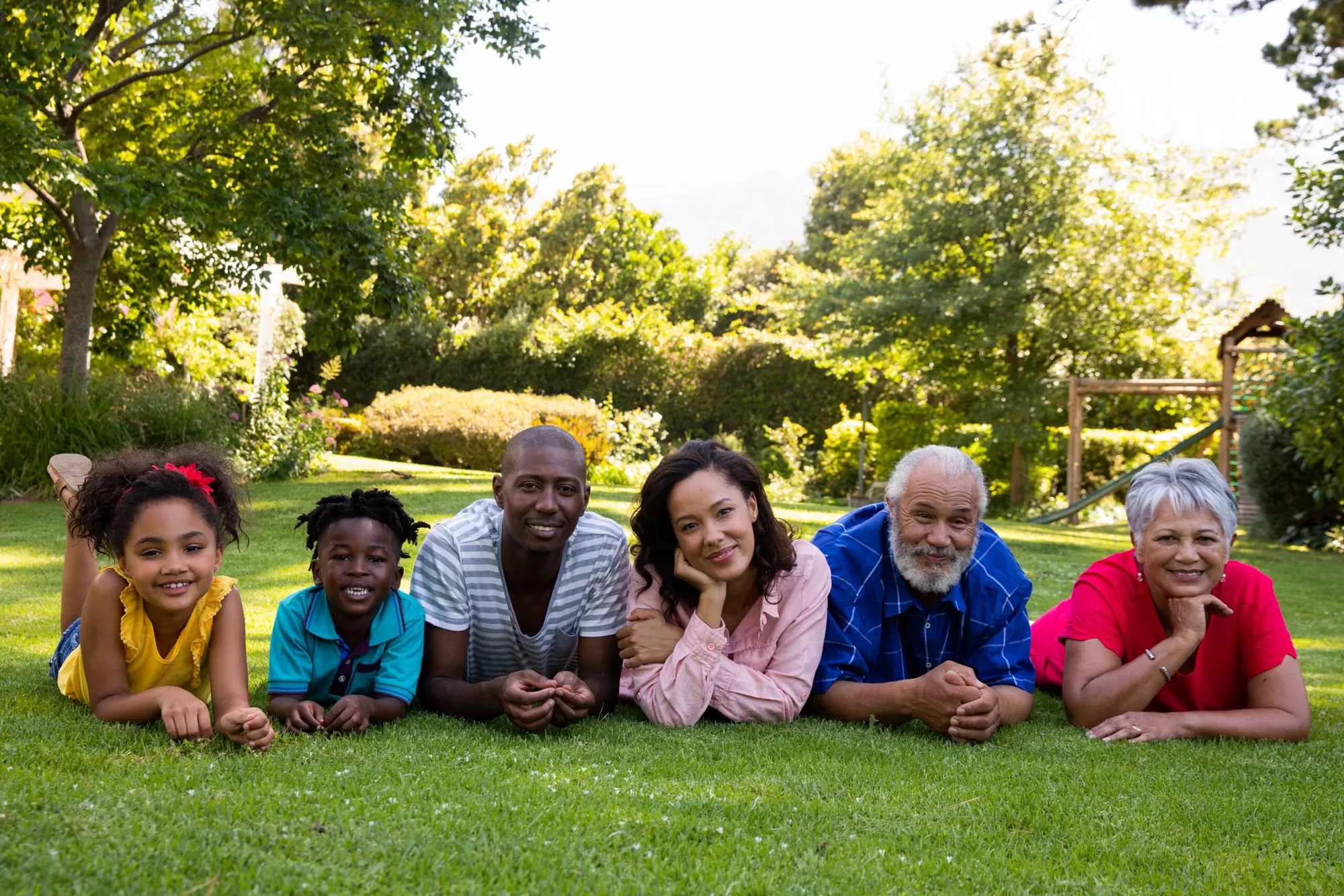 Family in garden showing the power of pets in everyday life