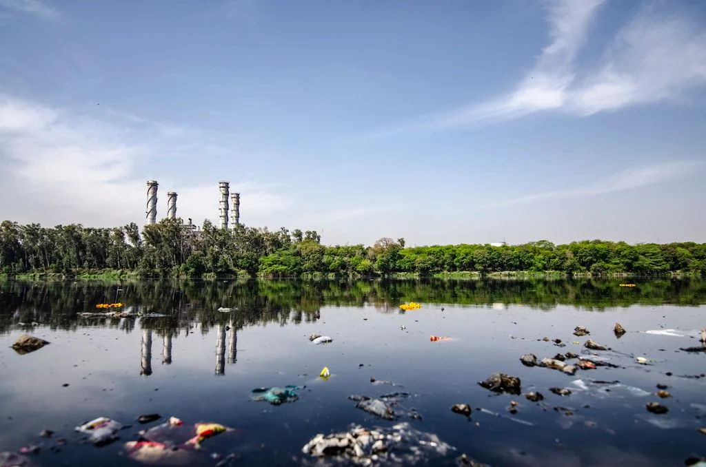 Polluted river with industrial backdrop — the global water crisis your school walk addresses
