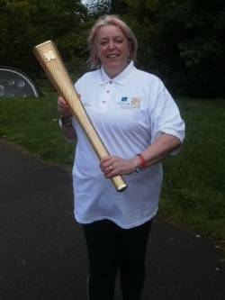 Injured soldier's Olympic torchbearer mum banned from wearing Help for Heroes wristband