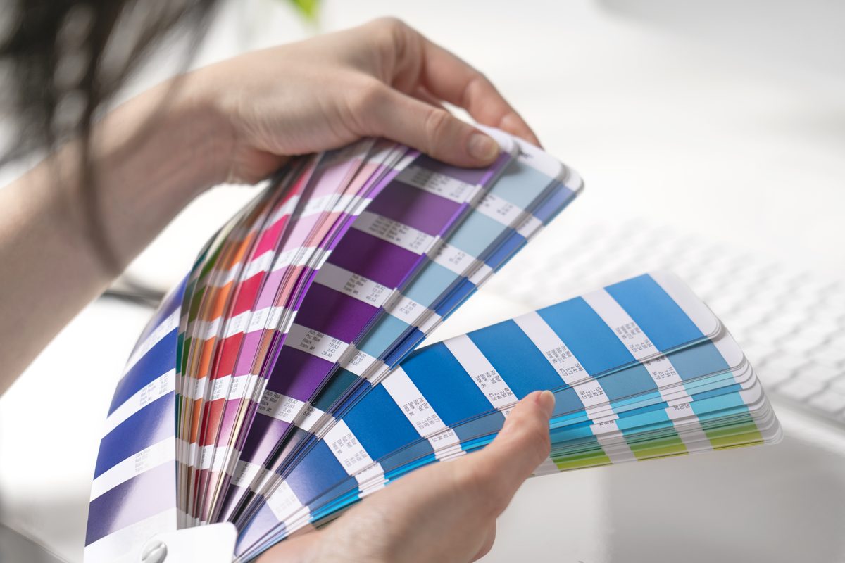 Handband designer selecting Pantone print colours at the Sydney studio